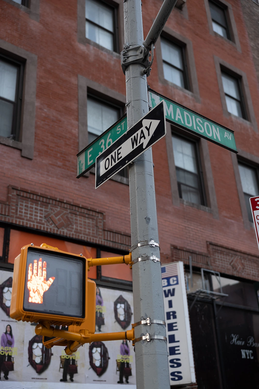 East 36th Street and Madison Avenue street signs near Revival